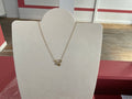 Collier doré épingle à nourrice