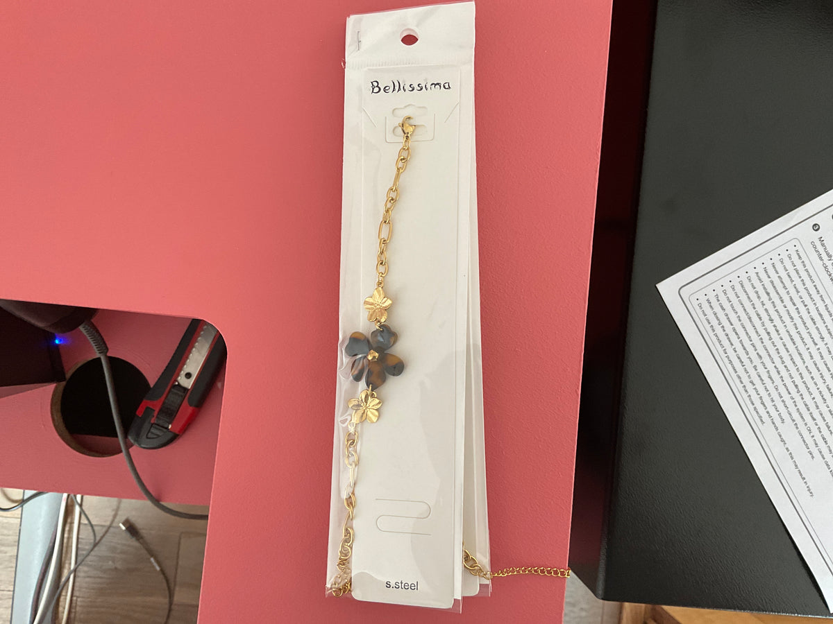 Bracelet doré 3 fleurs