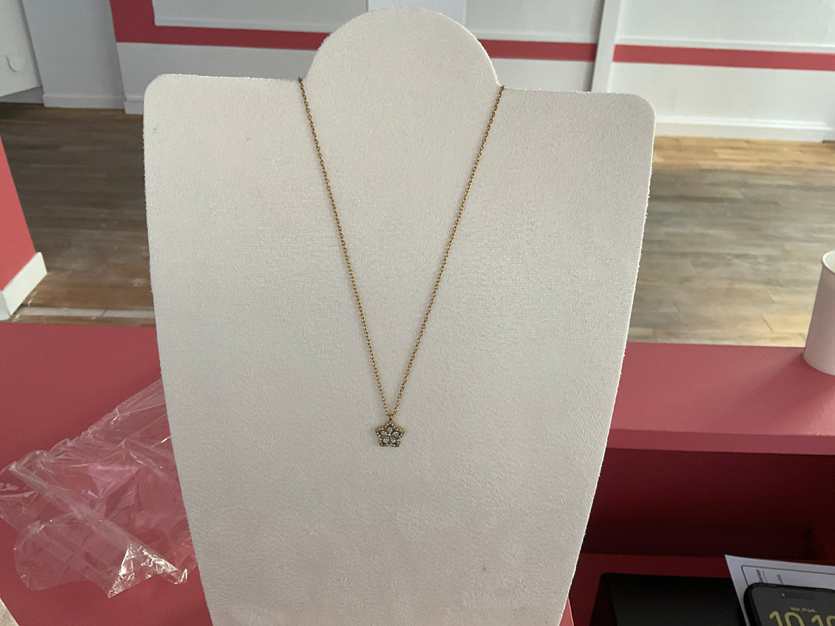 Collier doré pendentif fleur