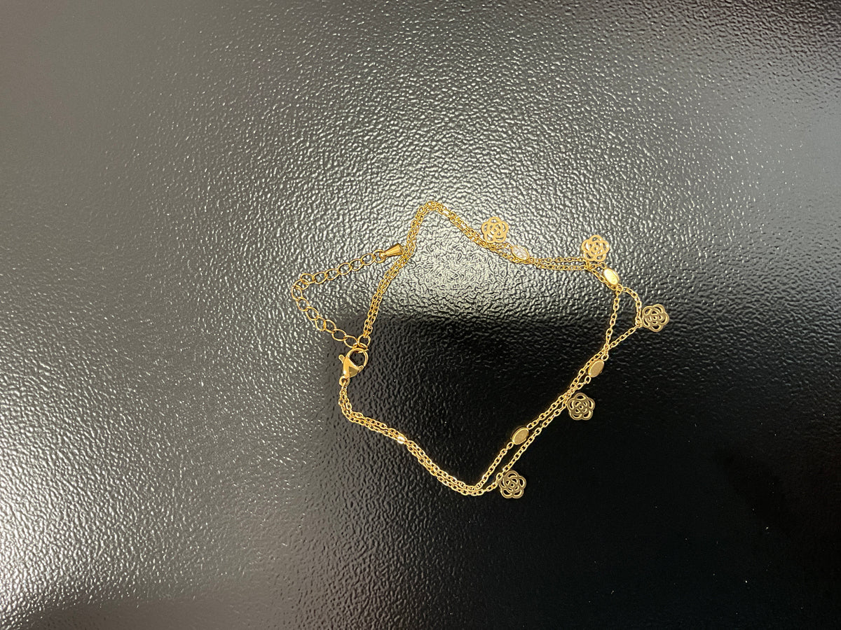 Chaîne cheville doré fleur et diamant