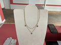 Collier doré double chaîne feuille