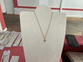 Collier doré croix